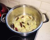 A picture of step 1 of Pea Dal (Yellow Split Peas) with Garden Herbs.