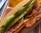 A picture of step 4 of Subway at home/ sub board.
