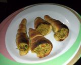 A picture of step 6 of Chicken filled cones.