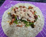A picture of step 8 of Paneer and Beans Burrito wrap.