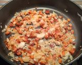 Foto del paso 2 de la receta: Arroz meloso con alcachofas y conserva de cerdo