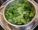 A picture of step 1 of Sickle senna leaves stir fry.