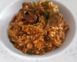 Foto del paso 8 de la receta: Arroz cremoso con sofrito de costillas de cerdo y alcachofas
