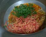 A picture of step 8 of Mongolian Chicken with vegetable rice.