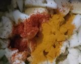 A picture of step 2 of Ghobhi aloo matar.