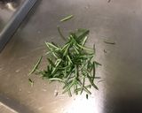 Une image de l'étape 3 de Maxi chipolatas marinées grillées ail et romarin.