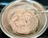 A picture of step 2 of Lobia chilla loaded with veggies.