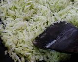 A picture of step 2 of Lauki halwa.