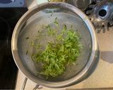 A picture of step 1 of Tzatziki (yoghurt and cucumber dip).