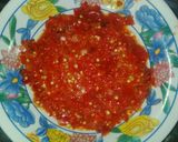A picture of step 10 of Moi-moi with pepper and spring onion sauce.