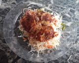 A picture of step 11 of Cheesy Noodles with Dumplings.
