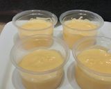 A picture of step 4 of Cream Custard shots with orange sauce.