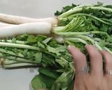 A picture of step 1 of Mooli ke Patton Ki Sabzi - (Radish Greens Stir Fry).
