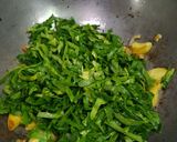 A picture of step 3 of Poi Saag and Potato Sabzi.