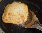 A picture of step 15 of Aloo Bedmi.