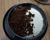 A picture of step 4 of Black forest ice cream cake.