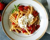 Foto del passaggio 6 della ricetta Sedanini con pomodori, anacardi e stracciatella
