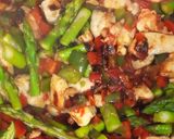 A picture of step 4 of Paella Rice with Chicken and Vegetables.
