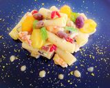 Foto del passaggio 8 della ricetta Tortiglioni con gamberi, crema di melanzane e datterini
