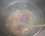 Foto del paso 2 de la receta: Calamares en salsa con arroz blanco y guisantes