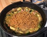 Une image de l'étape 10 de Lentilles brunes au lard, courgettes, pancetta et épices.