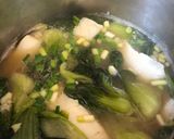 A picture of step 4 of Dad’s White Seabass Soup w/Bokchoy.