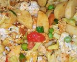 A picture of step 4 of Aloo Gobi Matar (Potato, Cauliflower, and Pea Curry).