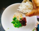 A picture of step 2 of PAAN COCONUT LADDU / BETEL leaf laddu/ Milkmaid paan coconut laddu.