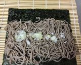 A picture of step 11 of Soba noodle Roll Sushi with shrimp Tempura.