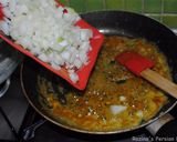 A picture of step 5 of Eggplatns onions with tomato sauce.