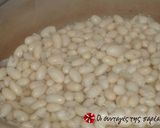 A picture of step 4 of Bean soup in a clay cooking pot.