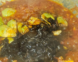 Foto del paso 5 de la receta: Arroz meloso de alcachofas y conserva de pota en su tinta