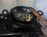 A picture of step 7 of Kumro shaak with chingri mach and dal a tasty lunch.
