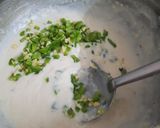 A picture of step 3 of Macaroni white sauce pasta with garlic bread.