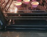 A picture of step 4 of Blueberries and vanilla frosted cup cakes.