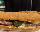 Foto del paso 4 de la receta Bocata de butifarra con pimientos y queso tetilla