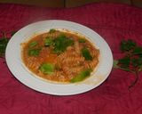 A picture of step 6 of Pasta sizzler sizzling with hot chilli powder, veggies, cheese.