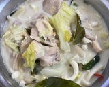 A picture of step 4 of Tom Kha Gai (Thai Coconut Chicken Soup) - Nong Khai's Version.