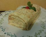 Foto del paso 6 de la receta Brazo de gitano relleno de turrón Jijona y revestido de chocolate blanco