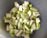 A picture of step 1 of Bottle gourd tomato curry.