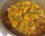 Foto del paso 20 de la receta: Arroz con chipirones, lomo de cerdo y gambones