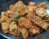 A picture of step 6 of Lotus roots with mirchi.