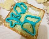 A picture of step 2 of Fun Shapes Roti Bakar Qysha.