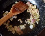 A picture of step 3 of Strapatsada with Tomato and Amaranth Greens.