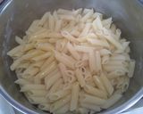 A picture of step 8 of Pasta with tomato, feta and ouzo sauce.