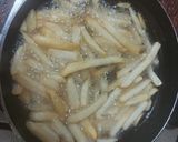 A picture of step 3 of Chicken and eggs cheese sandwiches with french fries.