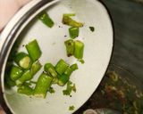 A picture of step 2 of Ambi onion chutney.