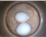 A picture of step 1 of Masala egg.