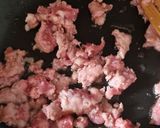 A picture of step 3 of Bajoques Farcides Agres (Stuffed Peppers with Rice and Sausage).