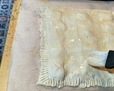 Foto del paso 9 de la receta: Empanada de hojaldre con jamón de york y queso